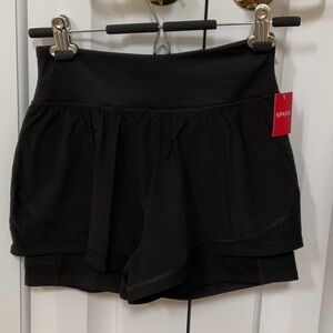 Spanx get moving short  two layered in black s/p retail $72. 50197R